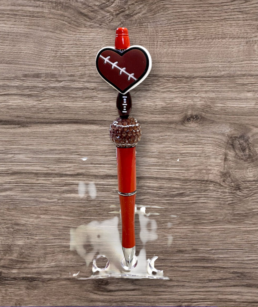 Orange w/ football heart